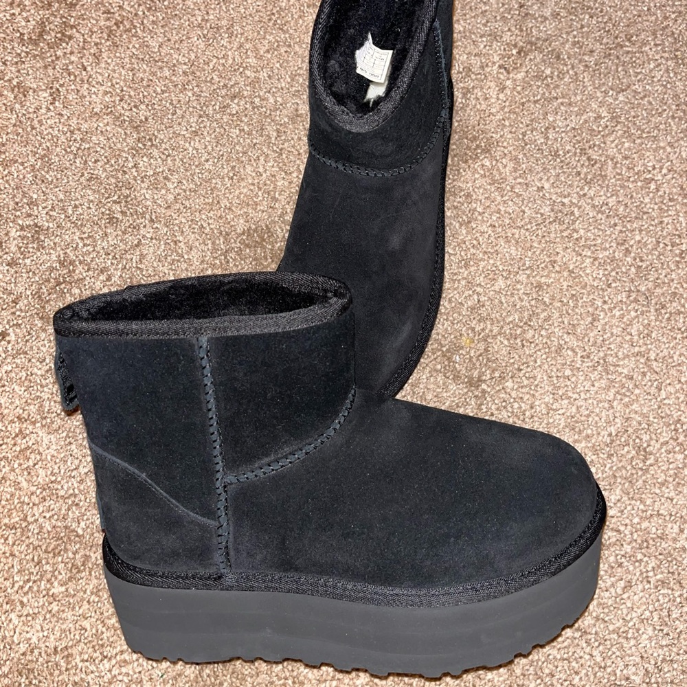 Black mini platform Uggs